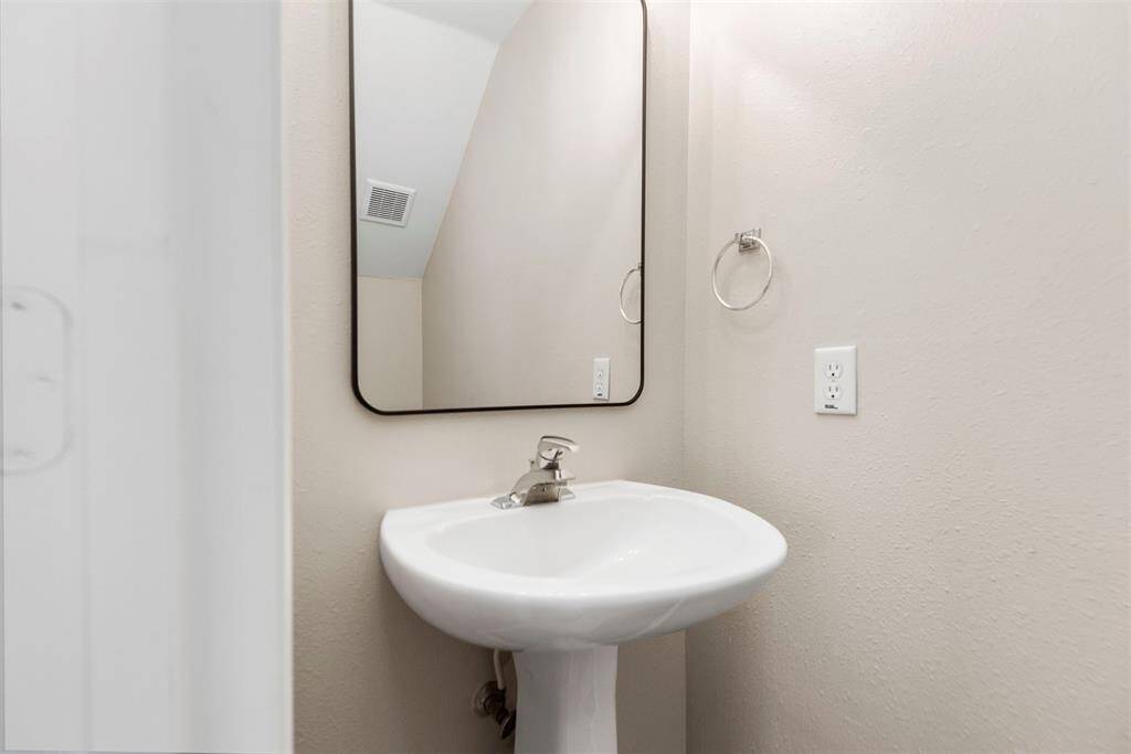 Half bath on the first floor off the living room