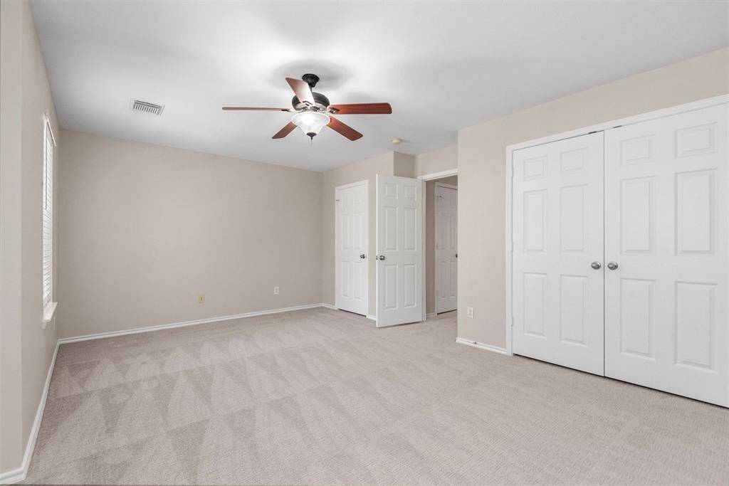 Two closets in the secondary bedroom