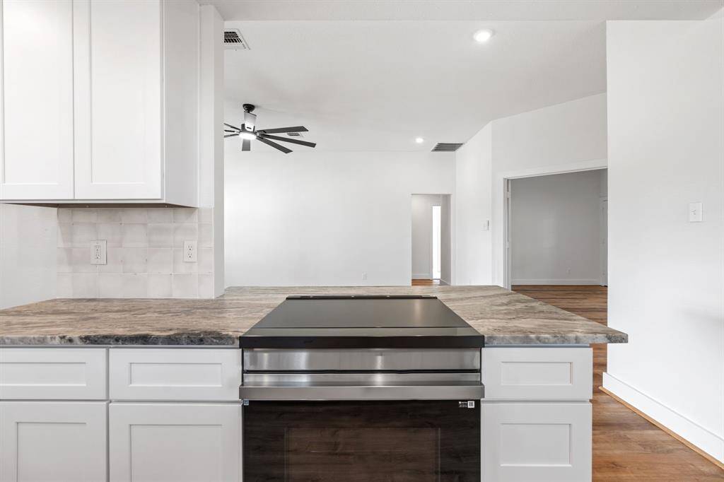 Kitchen overlooks living room