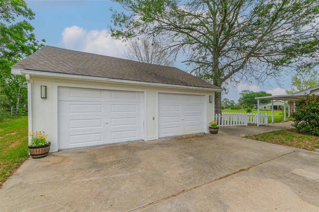 2 car garage with additional shop area