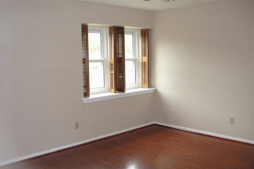 Spacious primary bedroom upstairs