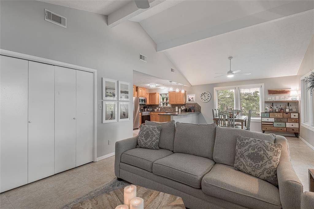 Utility room is just off the living room. Home comes fully furnished with all this beautiful furniture and decorations.