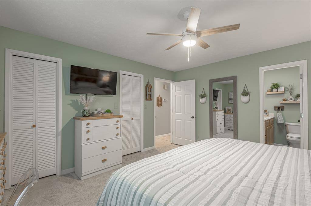 You will never want to leave the comfort of this primary bed room.