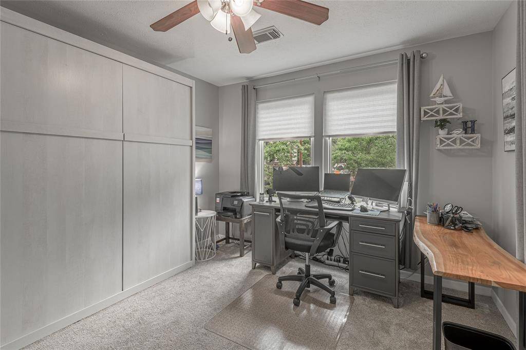 To the left is the beautiful murphy bed used for guest.