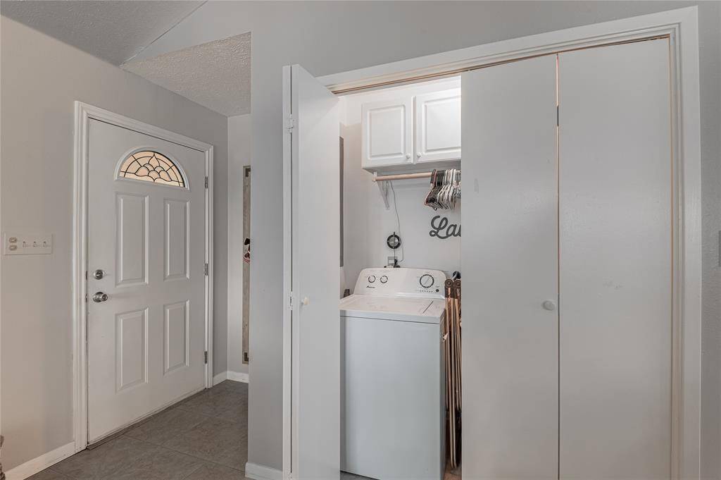 Utility room is just off the living room.
