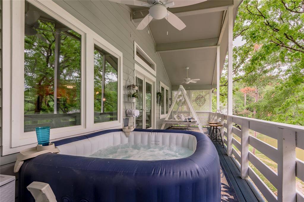 Hot tub and swing will remain with the home.  Can you imagine yourself soaking and relaxing.