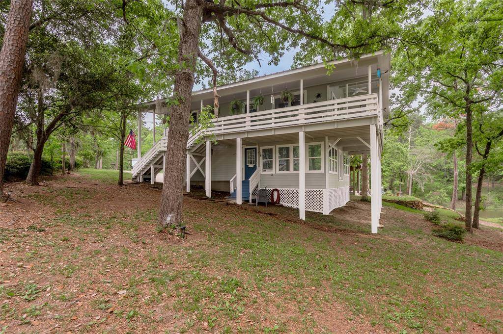 Back view of this beautiful home and wrap around porch.