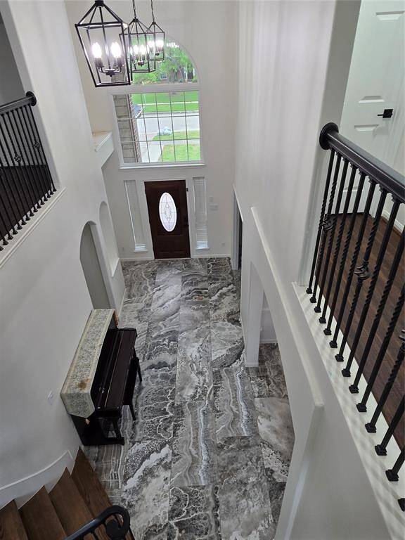 view of the entry and hallway from upstairs