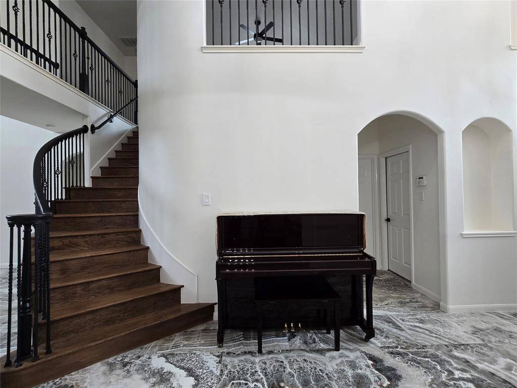 piano in the hallway for cash consideration