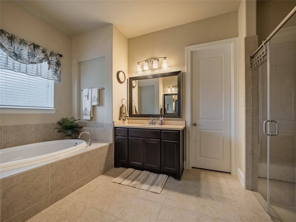 walk in shower with  glass doors