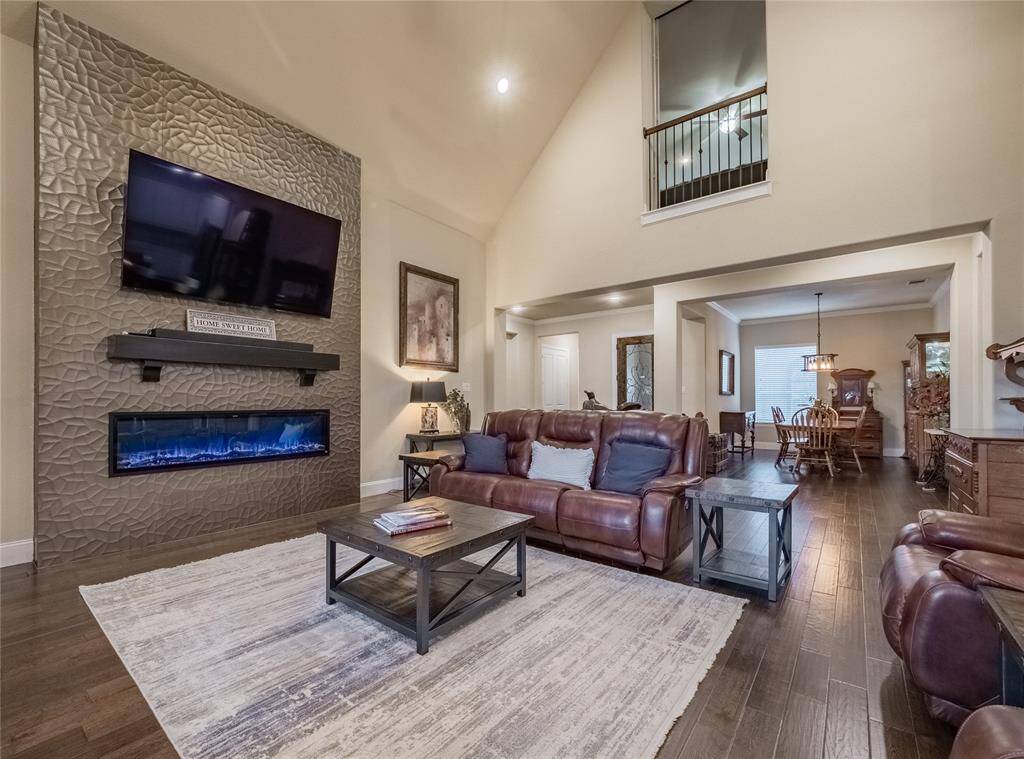 the family room is a beautiful view the minute you open the front door-on the left is your formal dining area, beautiful wood floors same thru out the entire home