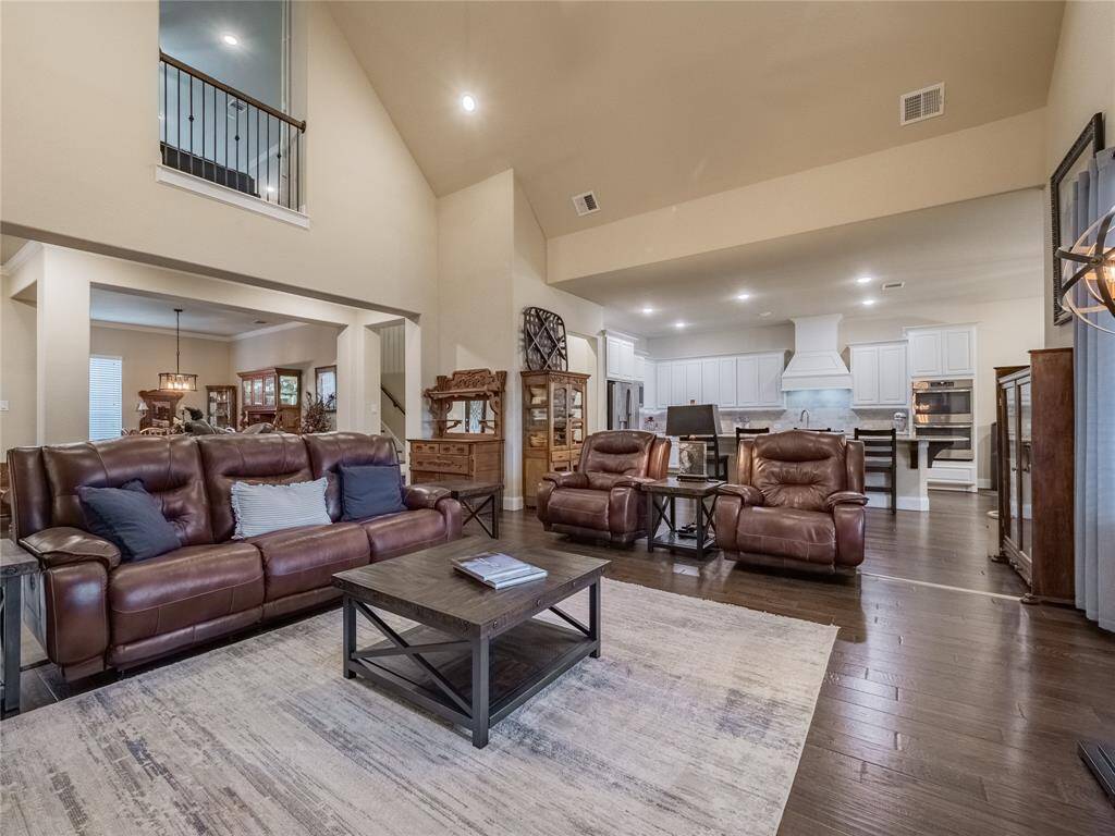 from this view you can see how seamlessly the family flows right into the kitchen to make it great for entertaining