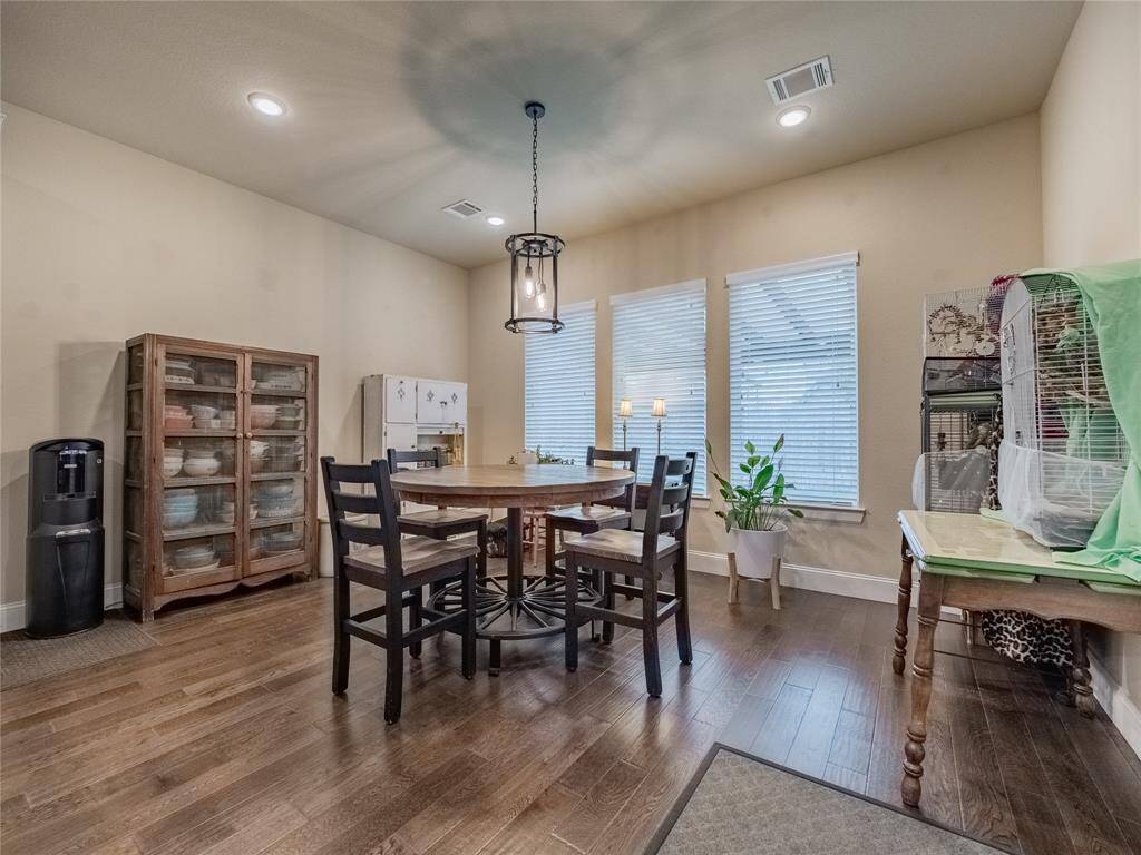 the breakfast is just off the kitchen with large windows facing the back yard