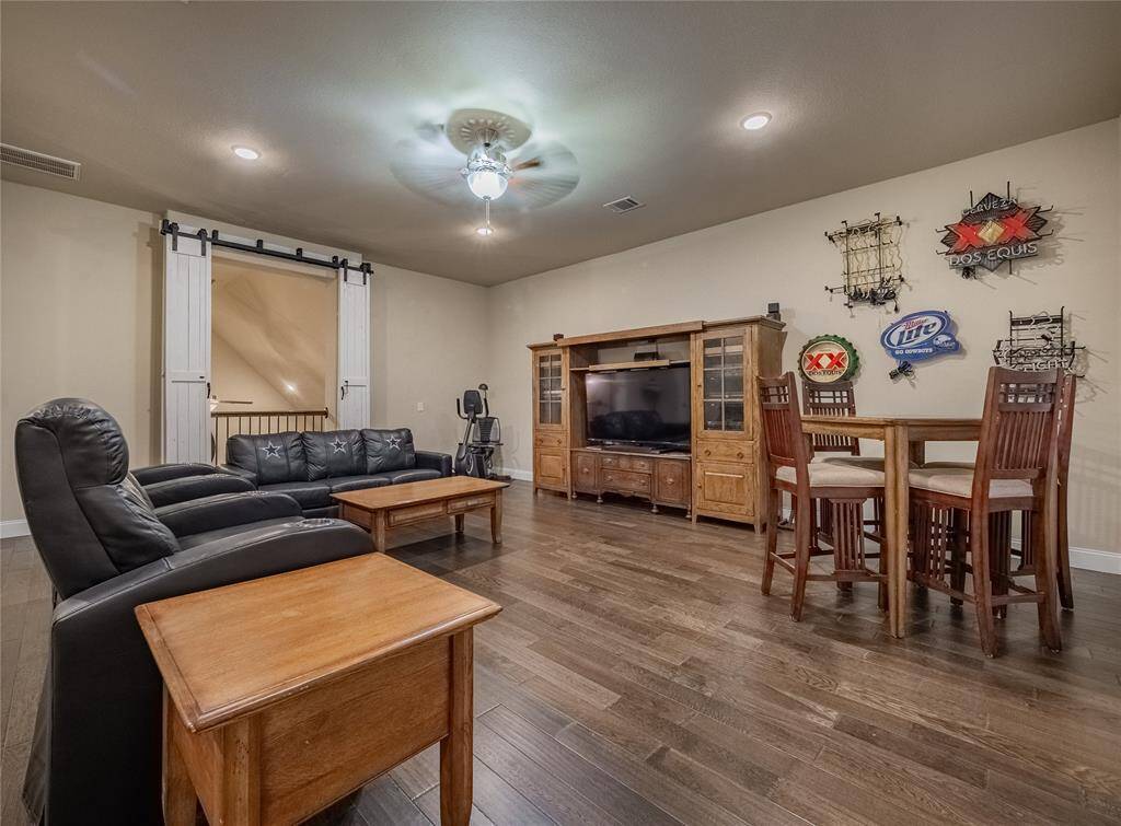 Game room upstairs makes a great play area or media room