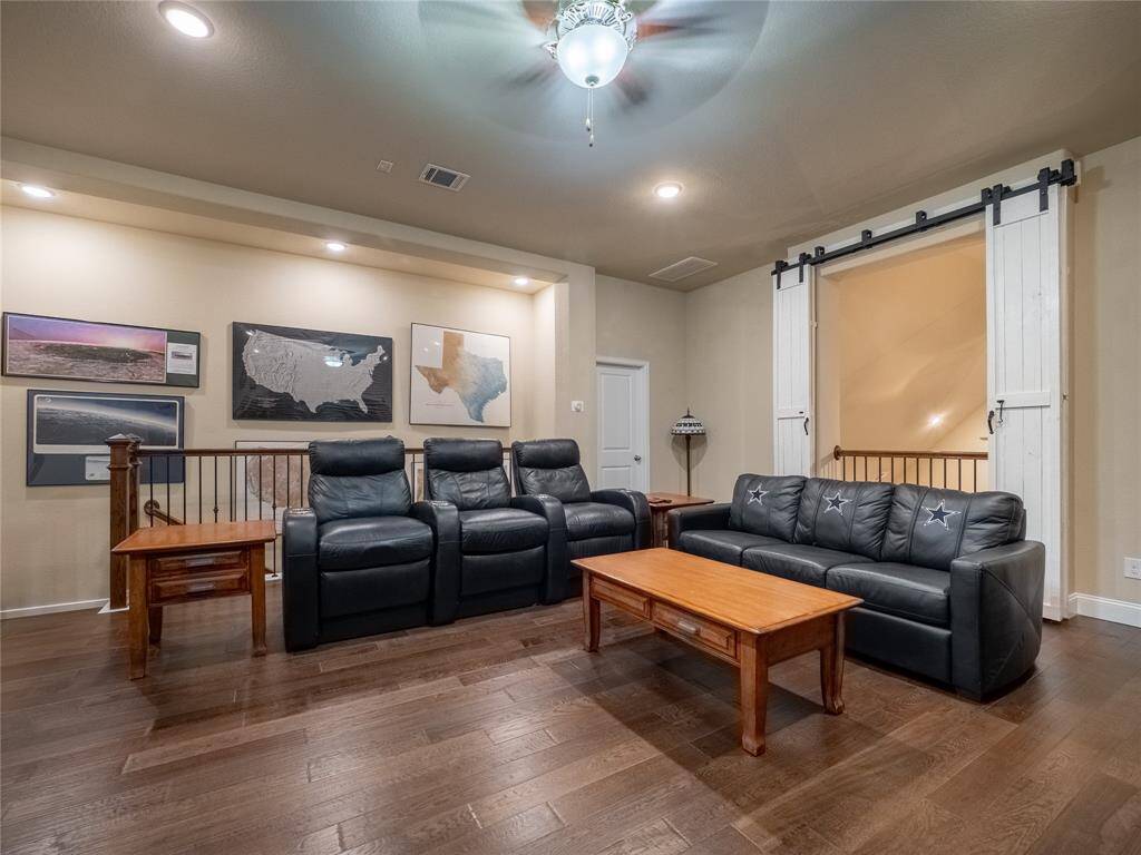 the game room also has the beautiful wood floors
