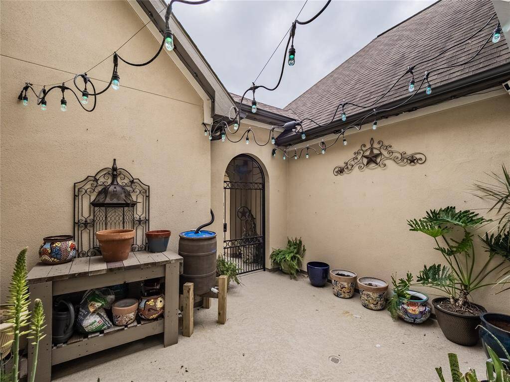 As you enter through the custom iron security gate you are greeted with this wonderful serene calming area to enjoy your morning beverage