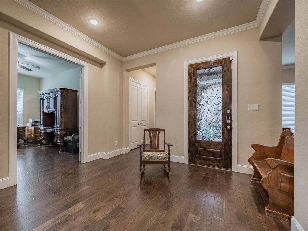 once inside the front door you are greeted with the family room in front of you and to the right you will find the office and bedrooms