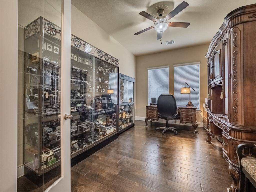 the office is very large double windows for natural light and has 8 ft glass double doors