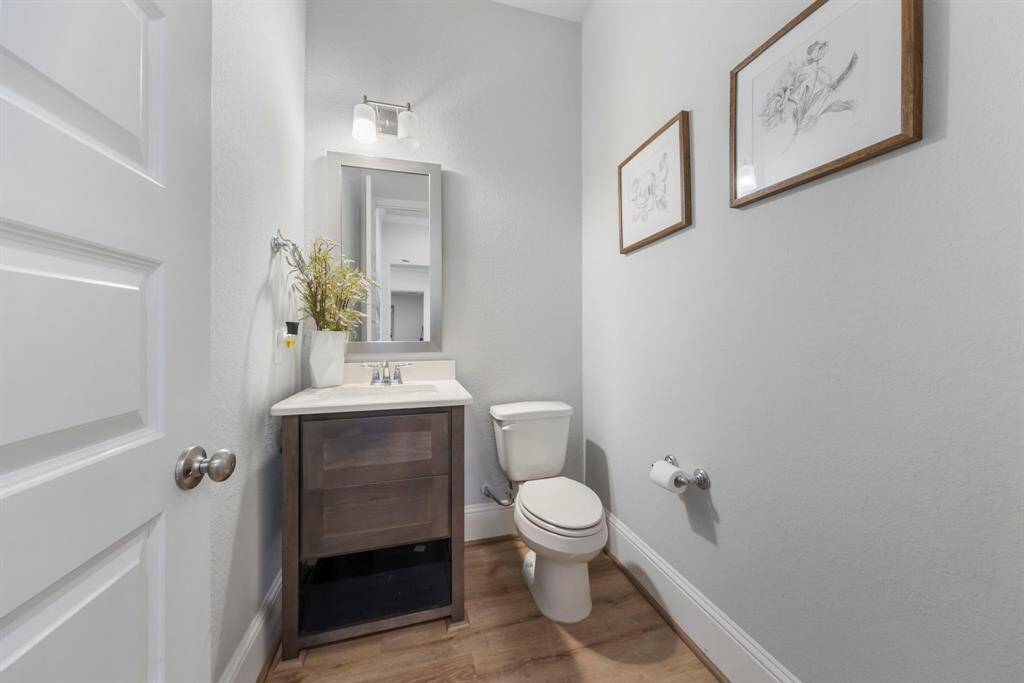 Powder bath conveniently located on first floor for guests.