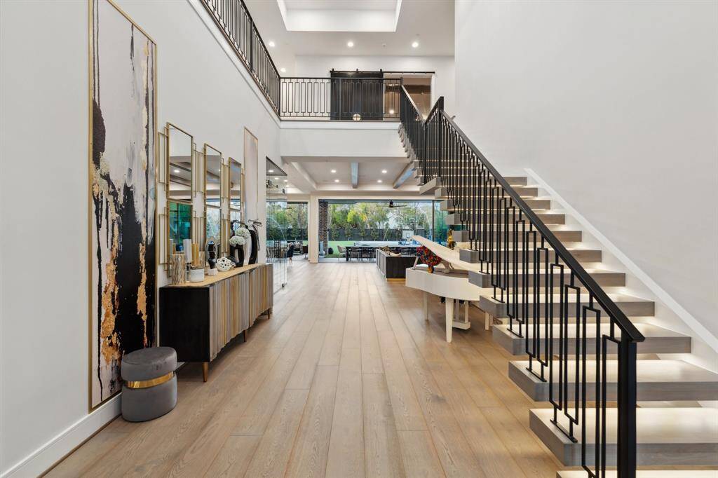 From the moment walking into the front door, you see the open space and clear view of the backyard