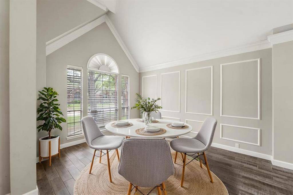 This area has neutral paint, crown molding and decorative box molding accents! (virtually staged)