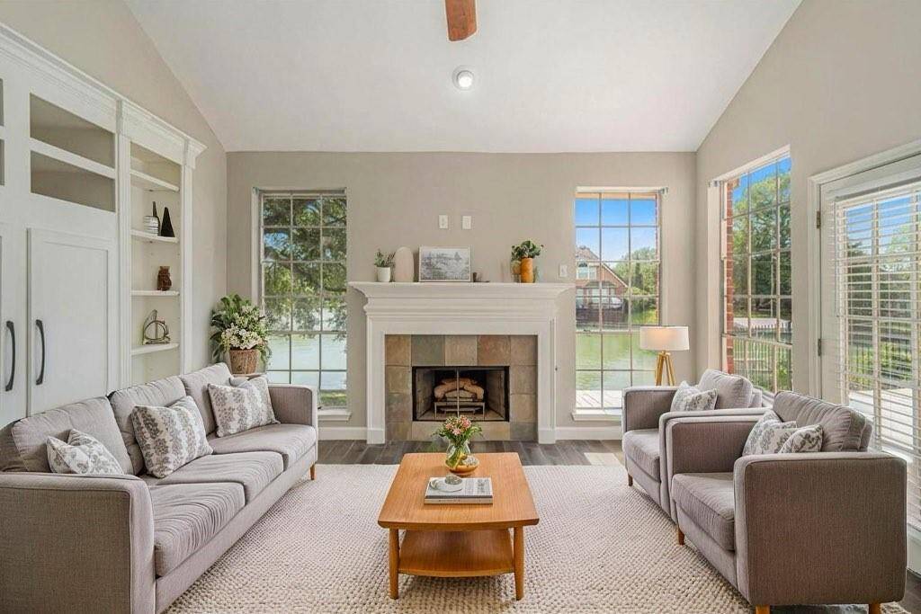 We virtually staged this fabulous family room so you know what it would feel like to kick back and relax in this warm and light filled room!