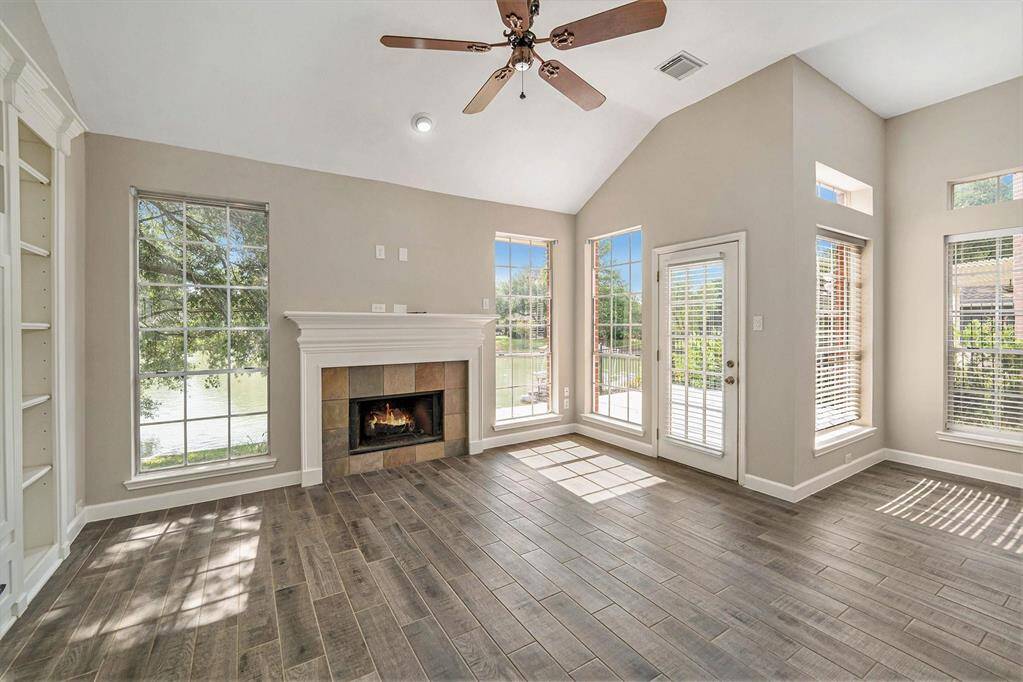 Imagine curling up on a cool winter's night next to this fireplace looking out the window watching the world pass by!
