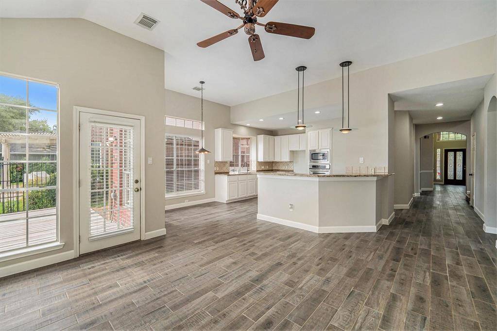 An open floor plan ideal for entertaining for gatherings large or small! A large breakfast bar offers additional seating too!