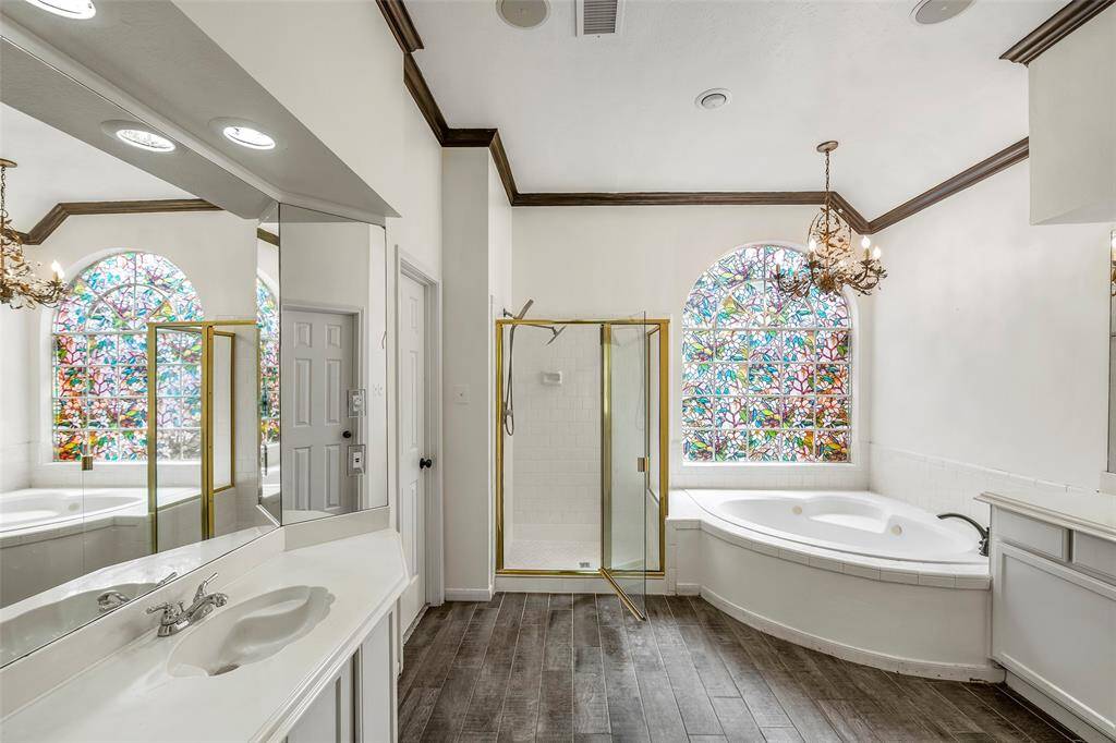 Do you prefer shower or steam? Choose either the glass enclosed shower or corner whirlpool tub to wash away your cares of the day! Bathroom includes another closet as well!