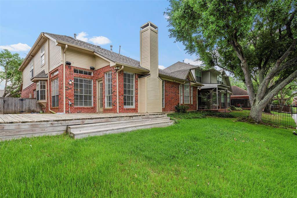 Step outside onto the deck and enjoy your backyard living spaces!
