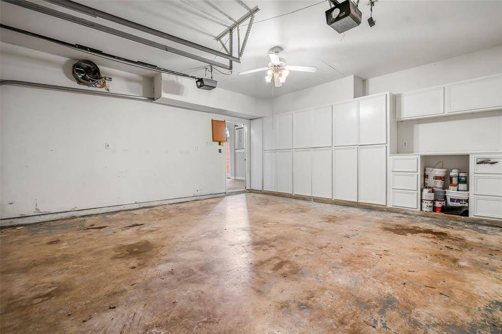 This garage has plenty of storage space for seasonal decor, tools or whatever you need! Garage fan helps circulate air on those hot summer days!