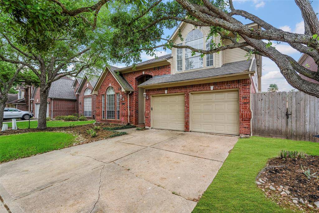 A double wide drive leads to the 2-car garage and provides ample parking for all!