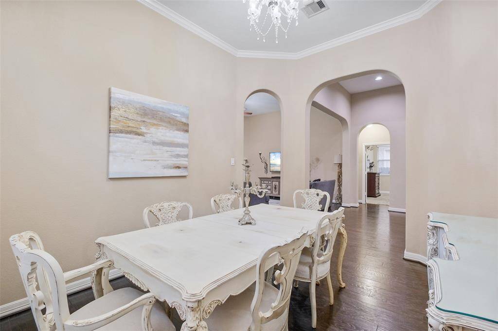Vintage charm, timeless layout. This space connects effortlessly to the main living area, bringing everyone together with comfort and class.