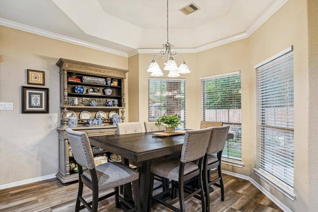 Bay windows offer a light-filled dining area.