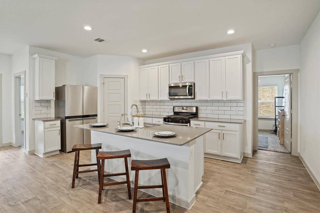 Kitchen w/ Stainless Steel Appliances