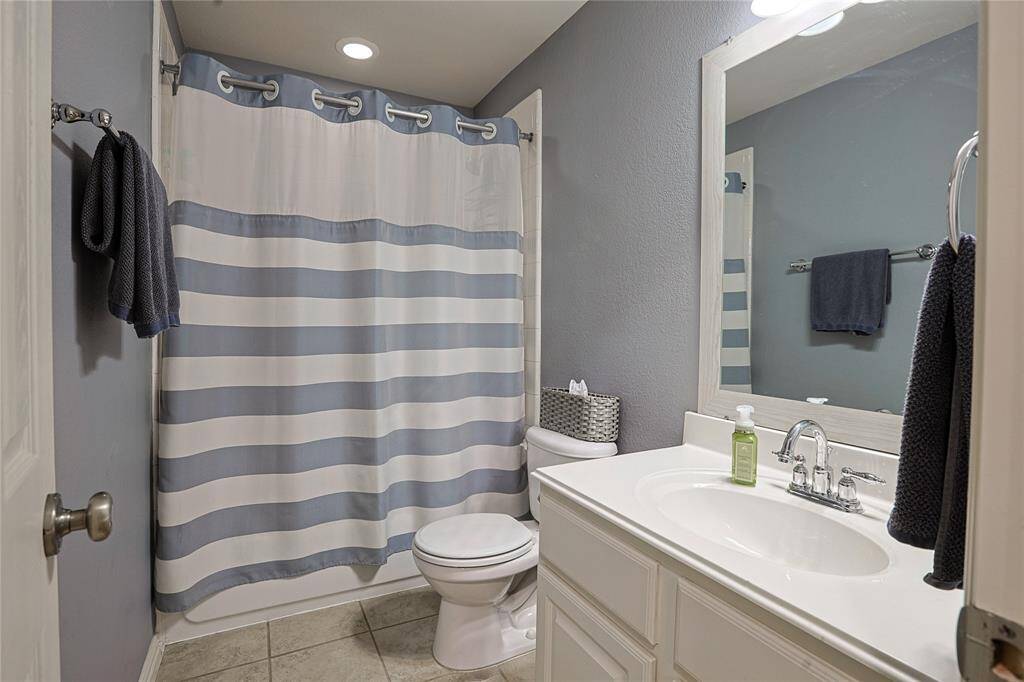 Secondary bathroom located beside the gameroom