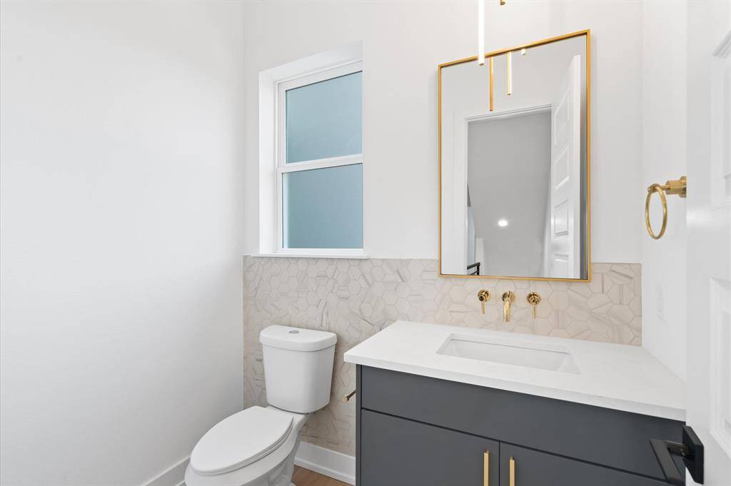 Powder bathroom off of living area