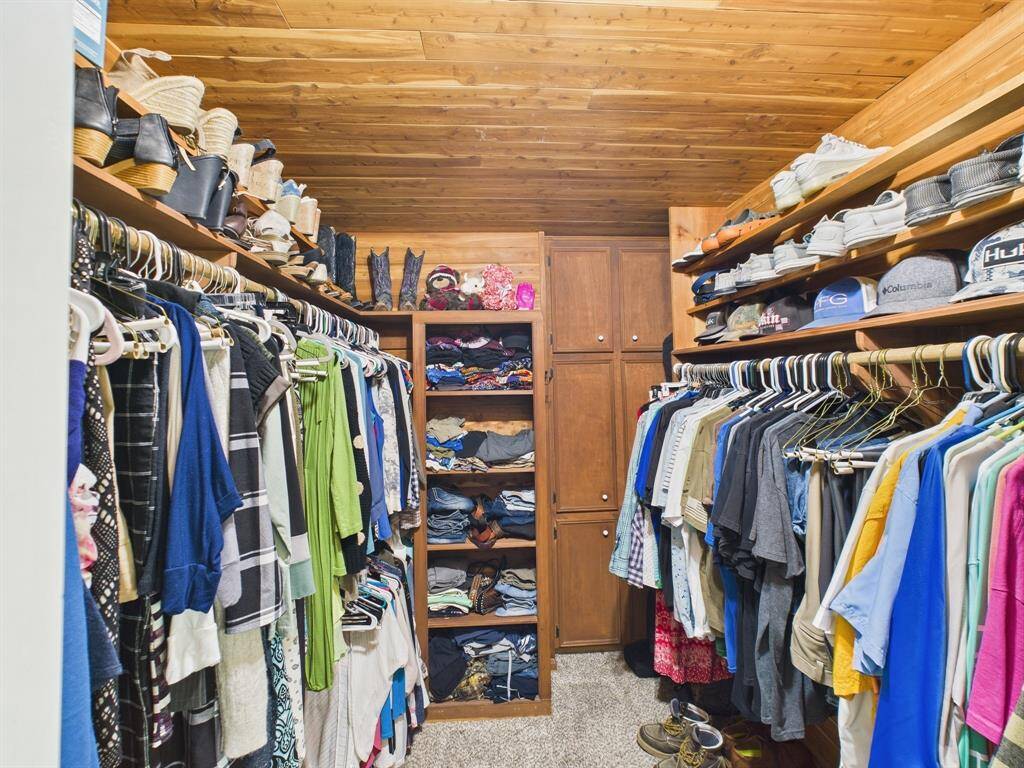 Primary Closet is all Cedar, with built in cabinets and shelving.