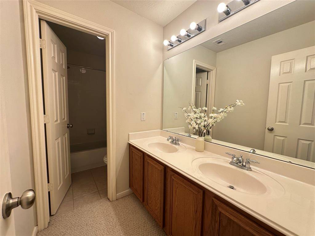The 3rd full bathroom w/two sinks