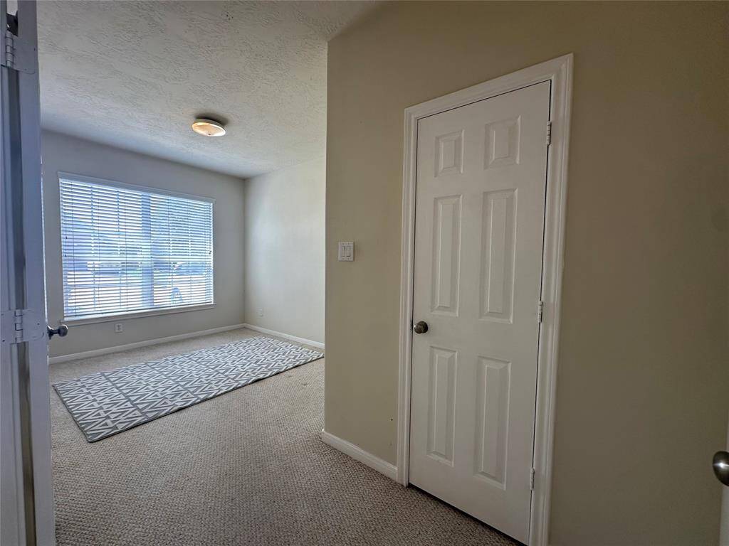 Home office with closet can be used as 5th bedroom