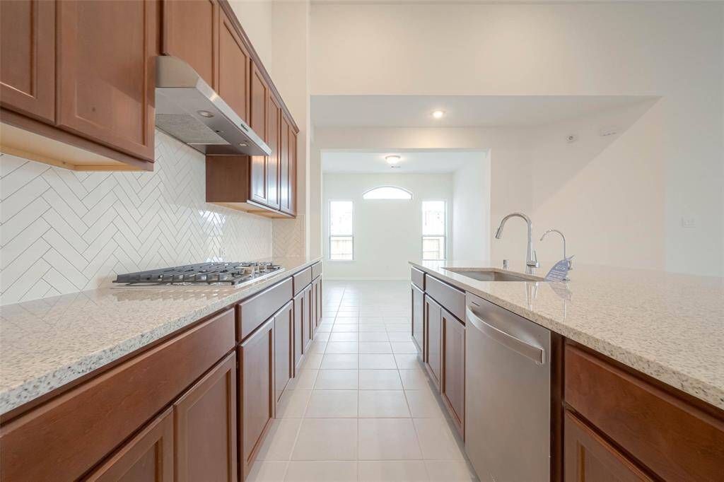 View of the kitchen and formal dining room
