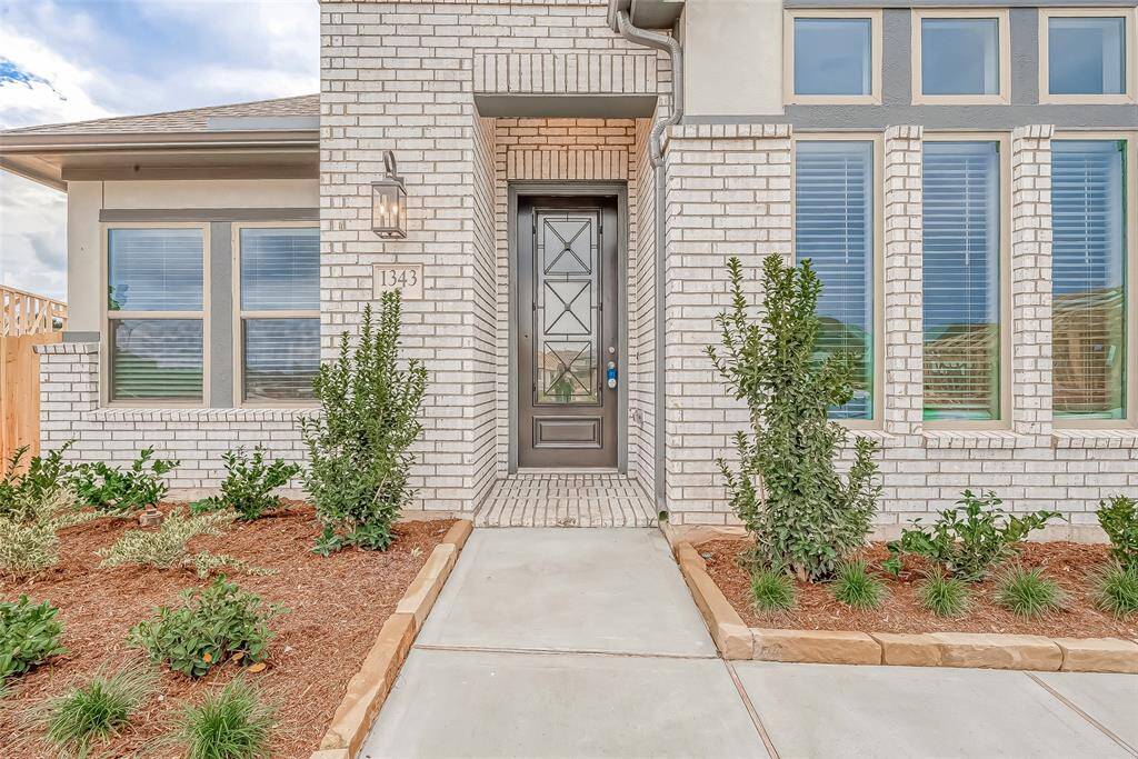 Inviting entry porch. Step inside and explore the beauty of this home!