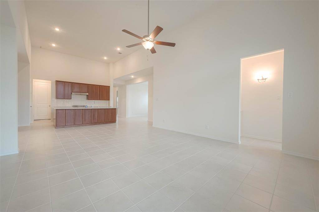 Sleek tile flooring throughout the main areas