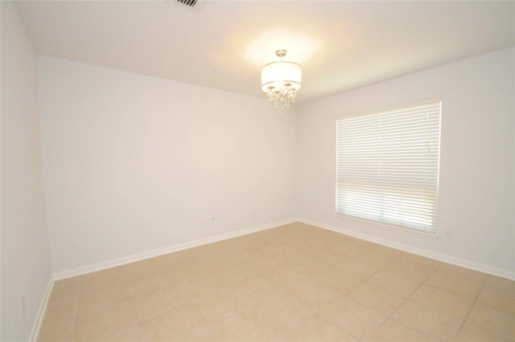 Spacious bedroom 2 with a convenient walk-in closet.
