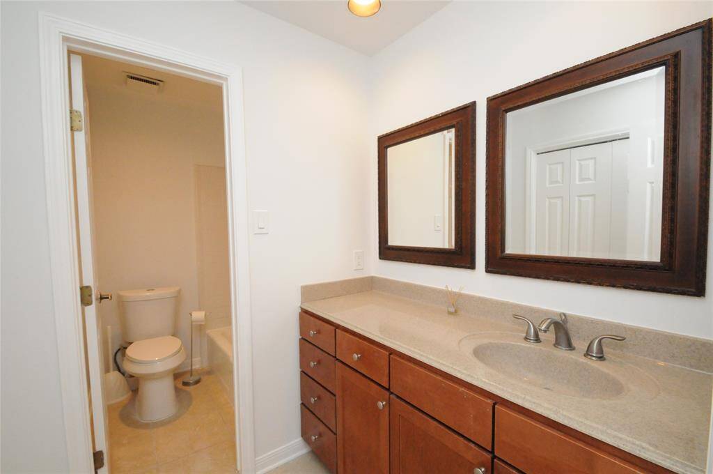 Convenient full bath for secondary bedrooms.