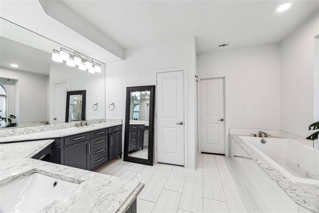 Primary Bathroom with Shower & Tub