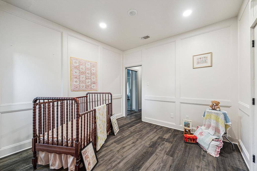 The front secondary bedroom is a cozy room at the front of the house.