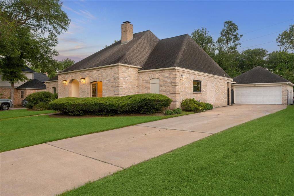 A view of the long driveway and double car garage.