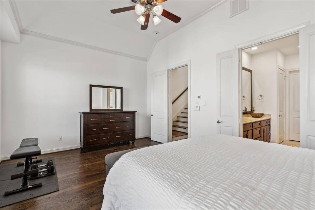 Through the double doors you'll find the primary ensuite bathroom.