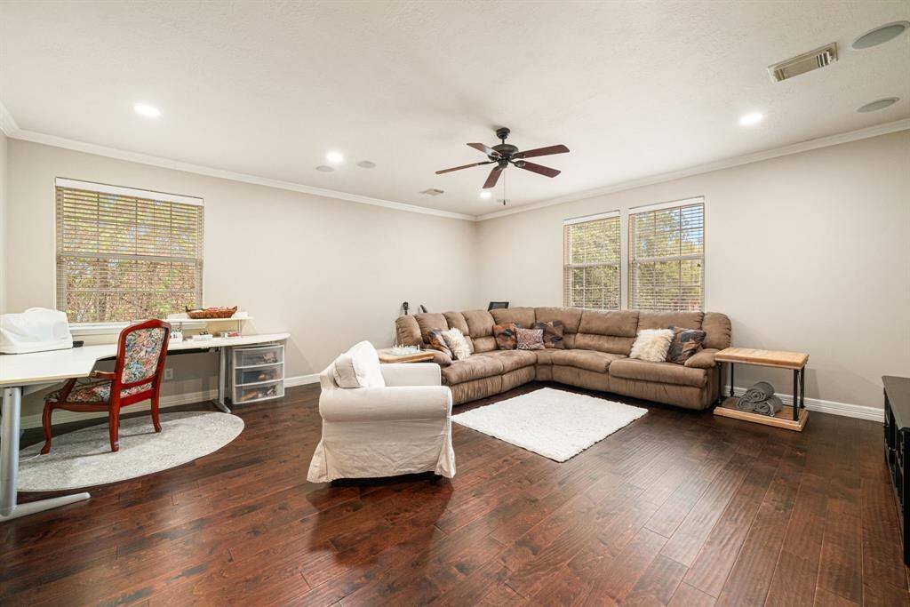 Generously-sized game room with recessed lighting, and ceiling fan